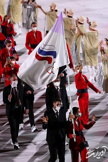 همه چیز درباره مراسم افتتاحیه المپیک ۲۰۲۰/ از حضور پرتعداد آمریکایی ها تا ورزشکار تونگایی که برهنه به ورزشگاه آمد/ کاروان ورزشی ایران با همان لباس قبلی رژه رفت/ عکس و ویدئو
